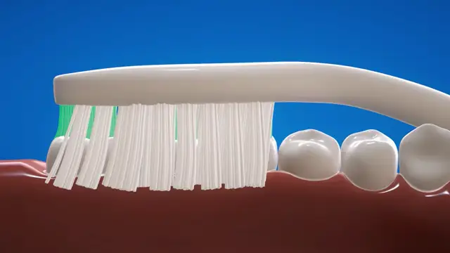 Groove Toothbrush moving over teeth and cleaning them